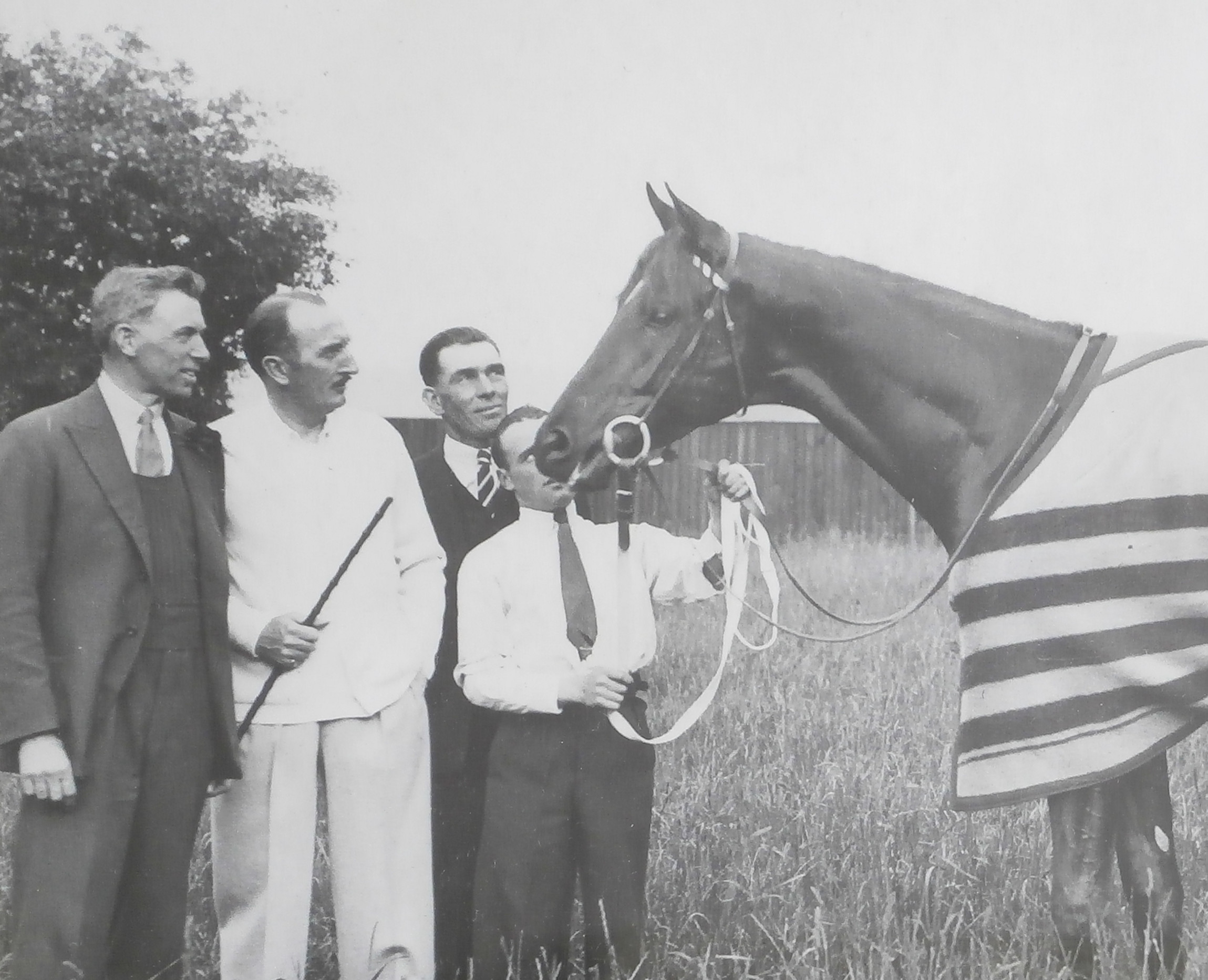 Sydney McGregor (breeder and part owner), left, with Tom Walls (part owner), GSL Whitelaw(?), Fred Lane (jockey) and April the Fifth (winner of the 1932 Epsom Derby) Events